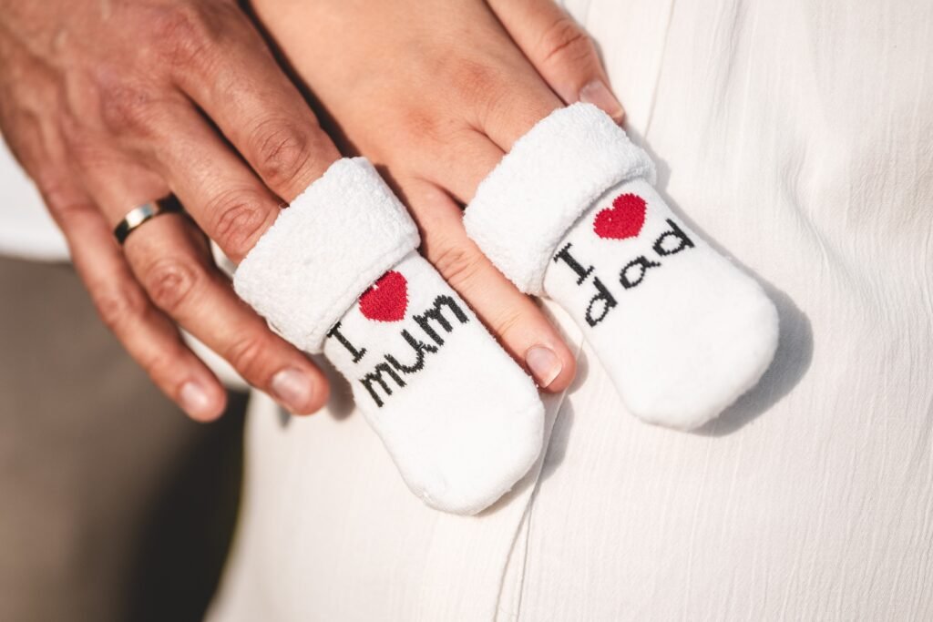 Custom gift socks held in both hands after unboxing